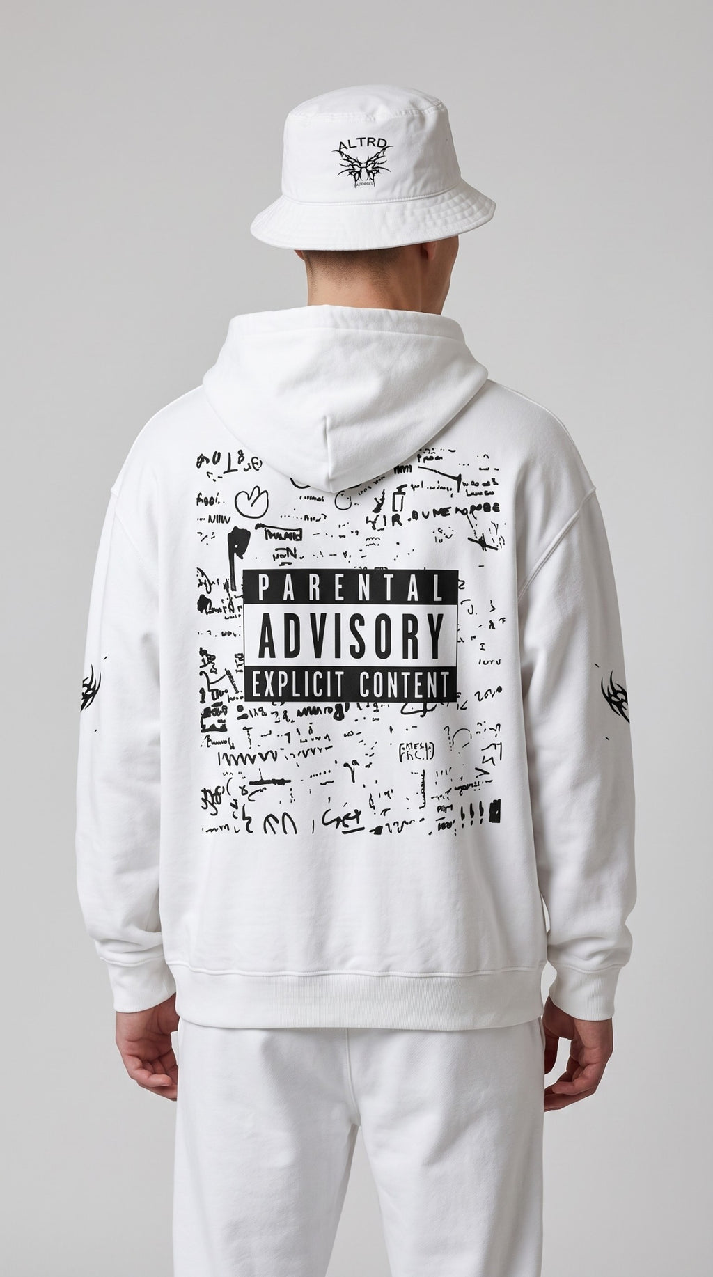 Back view of a person wearing an ALTRD Apparel white heavyweight hoodie with a Parental Advisory graphic print.