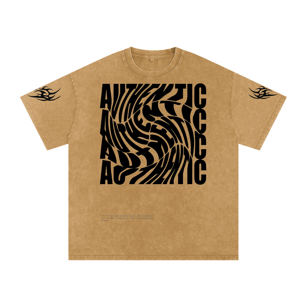Tan graphic tee with bold 'AUTHENTIC' swirl print and tribal sleeve designs, streetwear style